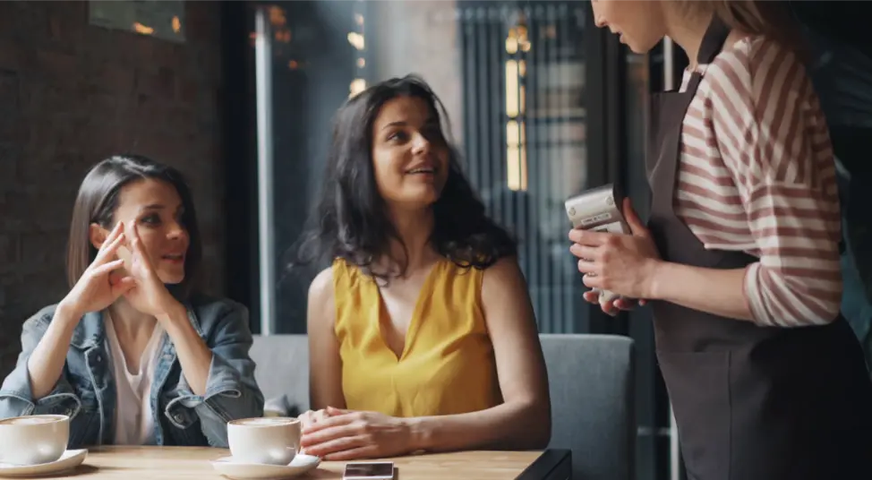 Woman paying with her credit card